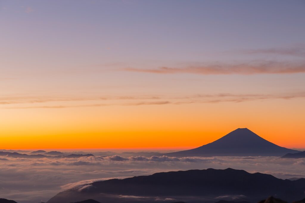 mount fuji, volcano, clouds, sunrise, sea of clouds, dawn, morning, orange sky, sky, silhouette, landscape, mountain, scenery, scenic, nature, japan, volcano, sunrise, japan, japan, japan, japan, japan-1352353.jpg